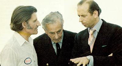 Graham Hill meeting with Lord Mountbaten and the Duke of Kent during the 1975 British GP at Silverstone